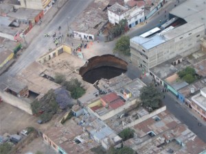 A sinkhole opens in Guatemala City, less than a mile from the archive.